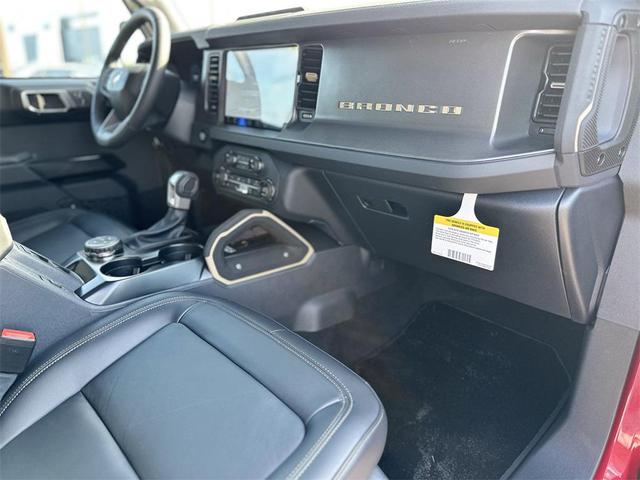 Photo of 2025 Ruby Red Metallic Tinted Clearcoat Ford Bronco