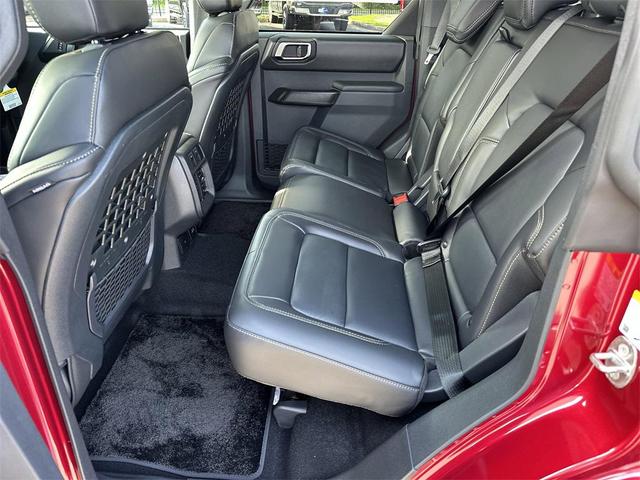 Photo of 2025 Ruby Red Metallic Tinted Clearcoat Ford Bronco