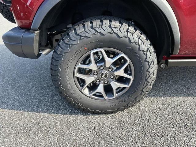 Photo of 2025 Ruby Red Metallic Tinted Clearcoat Ford Bronco
