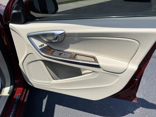 Photo of 2014 Flamenco Red Metallic Volvo S60