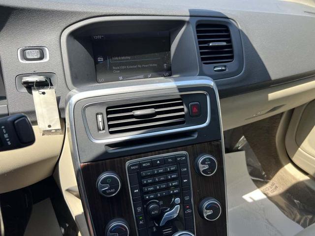 Photo of 2014 Flamenco Red Metallic Volvo S60