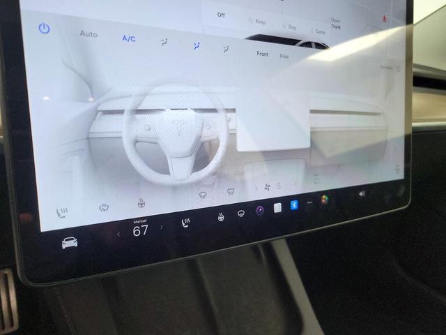 Photo of 2023 Black Tesla Model 3