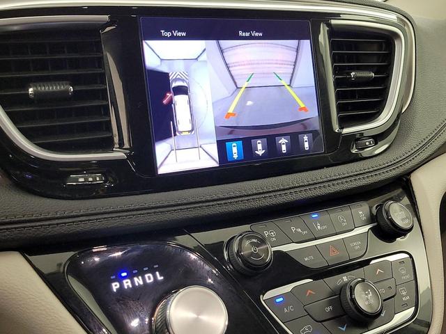 Photo of 2018 Burgundy Chrysler Pacifica