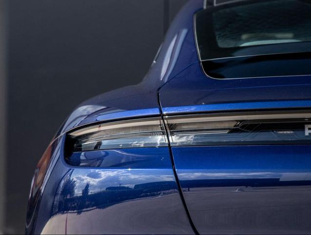 Photo of 2023 Gentian Blue Metallic Porsche Taycan