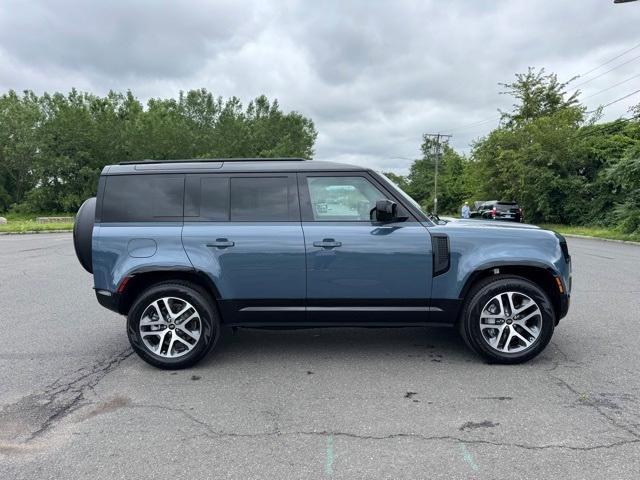 Photo of 2025 Tasman Blue Land Rover Defender