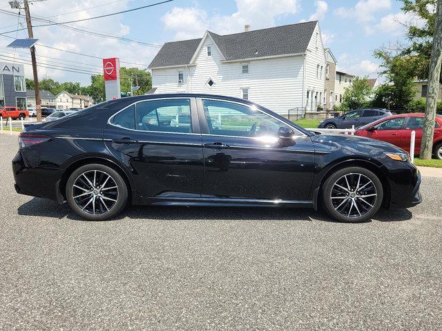 Photo of 2023 Midnight Black Metallic   218 Toyota Camry
