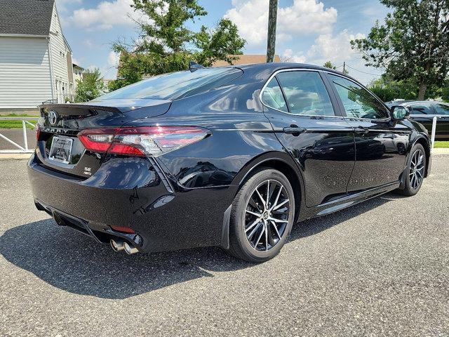 Photo of 2023 Midnight Black Metallic   218 Toyota Camry