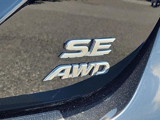 Photo of 2023 Midnight Black Metallic   218 Toyota Camry