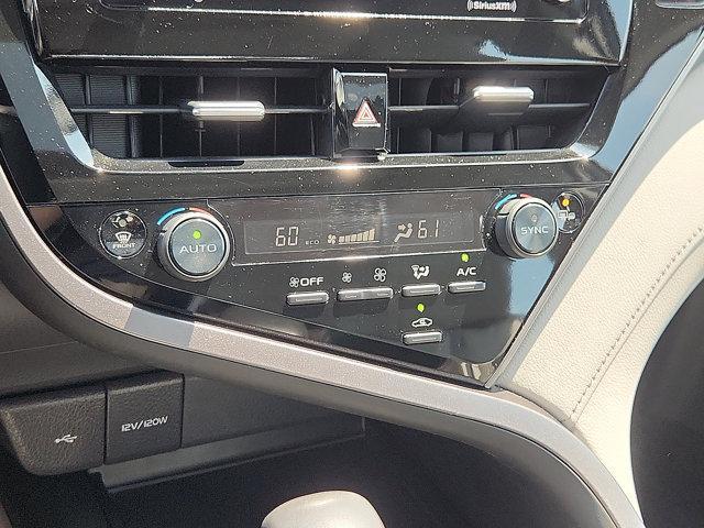 Photo of 2023 Midnight Black Metallic   218 Toyota Camry