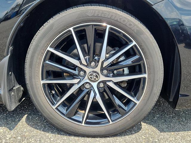 Photo of 2023 Midnight Black Metallic   218 Toyota Camry