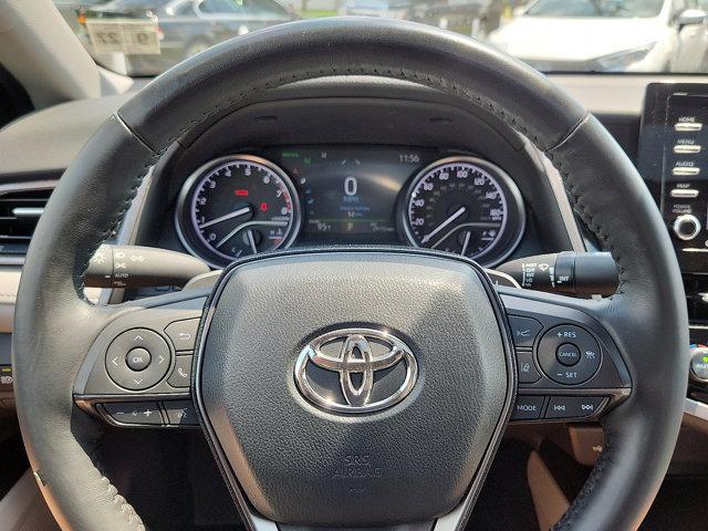 Photo of 2023 Midnight Black Metallic   218 Toyota Camry