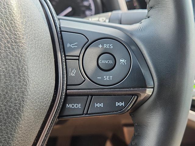 Photo of 2023 Midnight Black Metallic   218 Toyota Camry