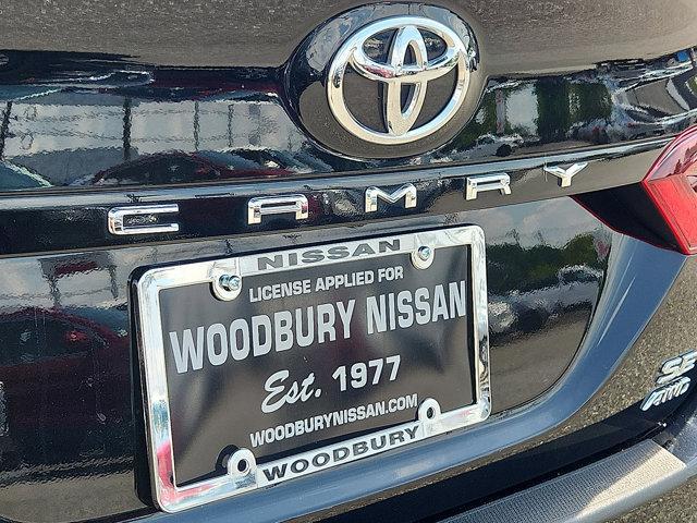 Photo of 2023 Midnight Black Metallic   218 Toyota Camry