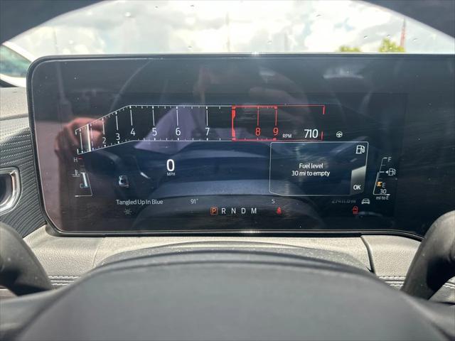 Photo of 2024 Vapor Blue Metallic Ford Mustang