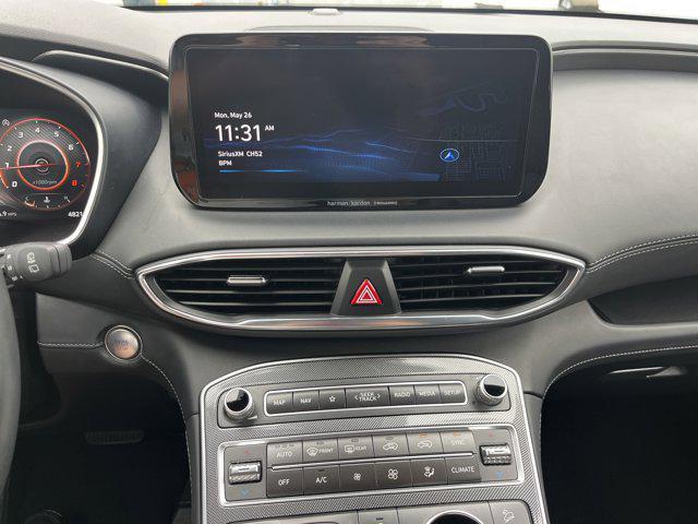 Photo of 2023 Calypso Red Hyundai SANTA FE