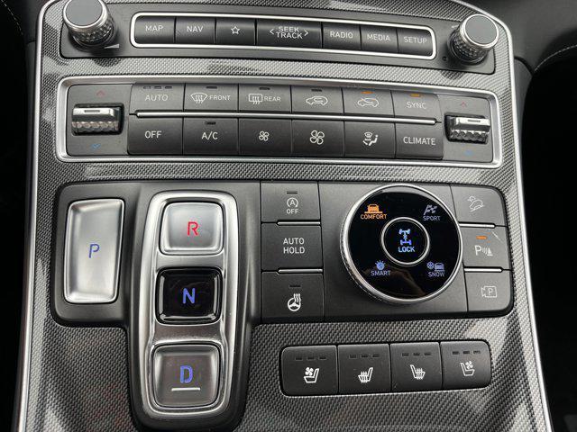 Photo of 2023 Calypso Red Hyundai SANTA FE