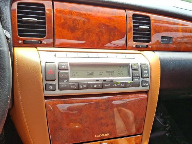 Photo of 2004 Egyptian Sand Pearl Lexus SC 430