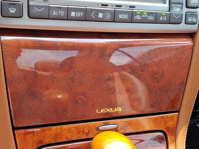 Photo of 2004 Egyptian Sand Pearl Lexus SC 430