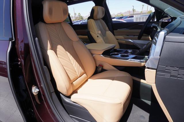 Photo of 2025 Black Cherry Tintcoat Cadillac Escalade IQ