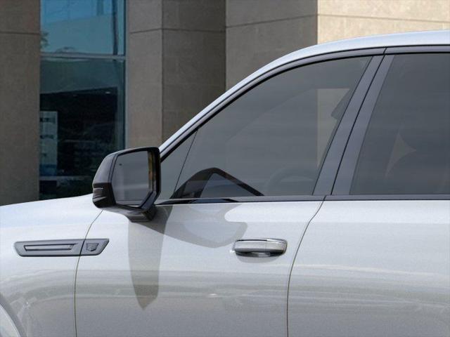 Photo of 2025 Flare Metallic Cadillac Escalade IQ
