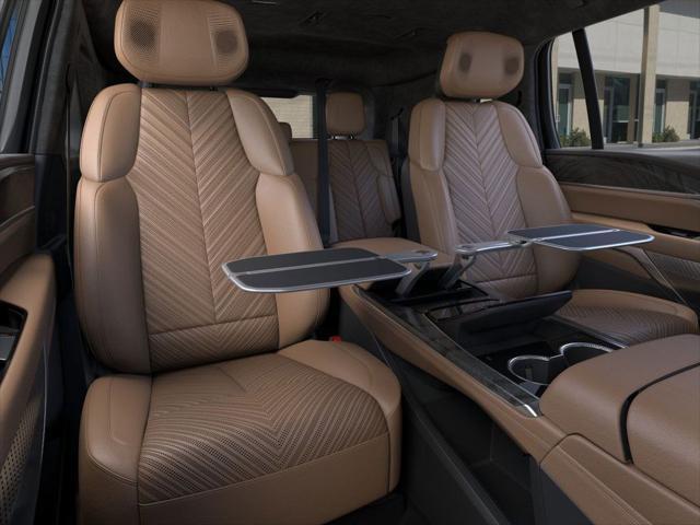 Photo of 2025 Flare Metallic Cadillac Escalade IQ
