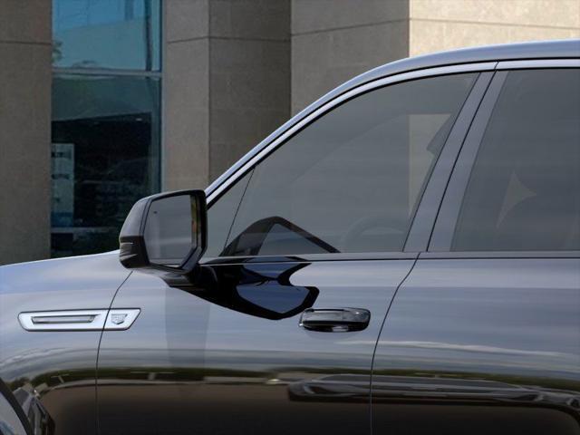 Photo of 2025 Black Raven Cadillac Escalade IQ