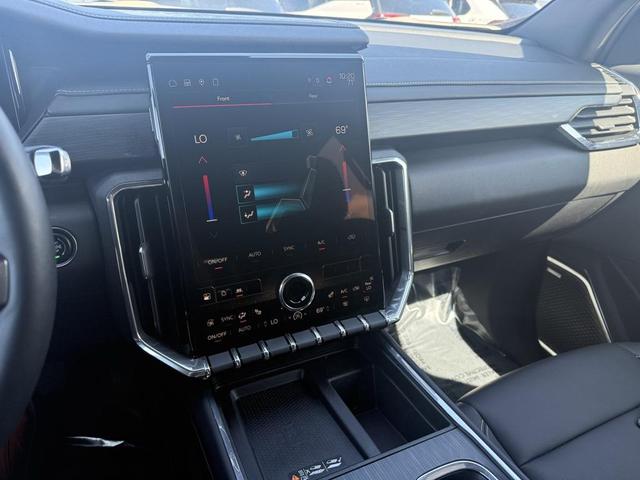 Photo of 2024 Volcanic Red Tintcoat GMC Acadia