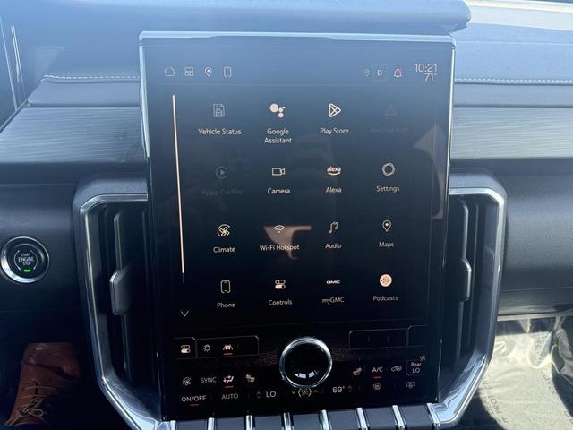 Photo of 2024 Volcanic Red Tintcoat GMC Acadia