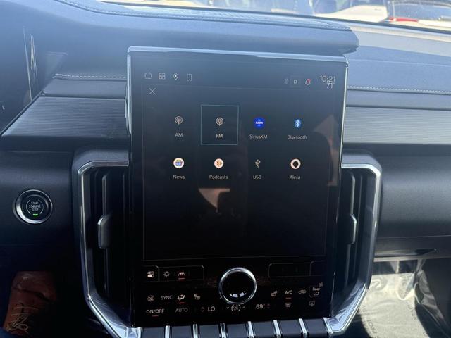Photo of 2024 Volcanic Red Tintcoat GMC Acadia