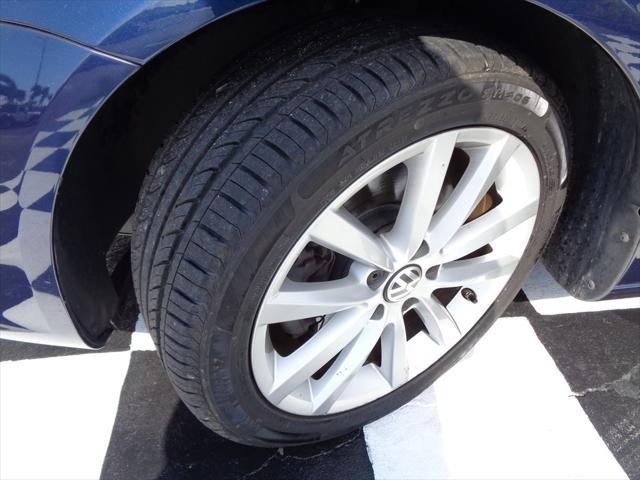 Photo of 2012 DK BLU Volkswagen Eos