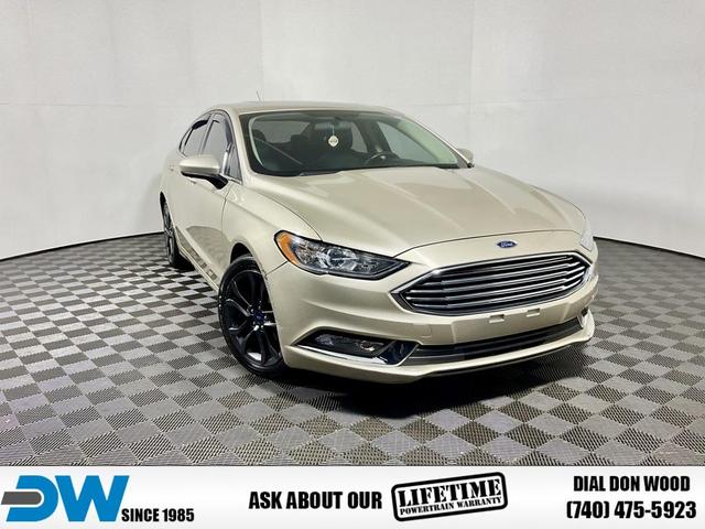 Photo of 2018 White Gold Metallic Ford Fusion