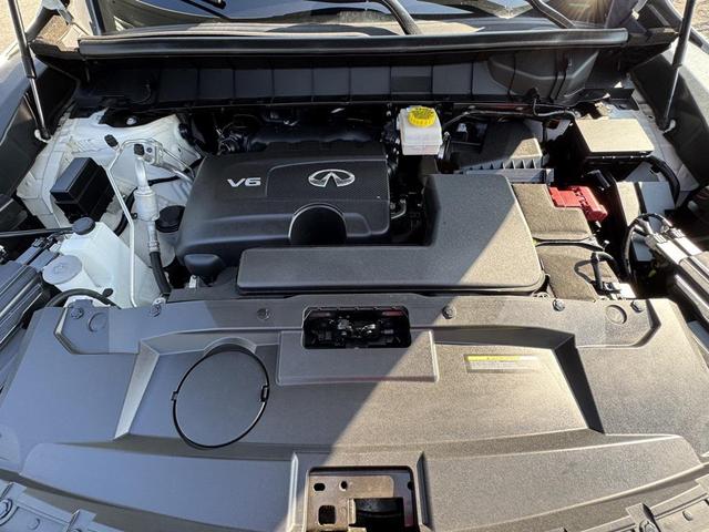 Photo of 2023 Majestic White/Black Obsidian INFINITI QX60
