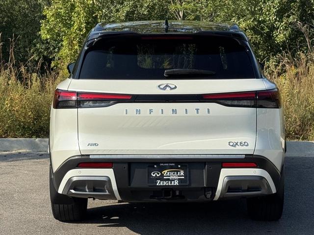 Photo of 2023 Majestic White/Black Obsidian INFINITI QX60