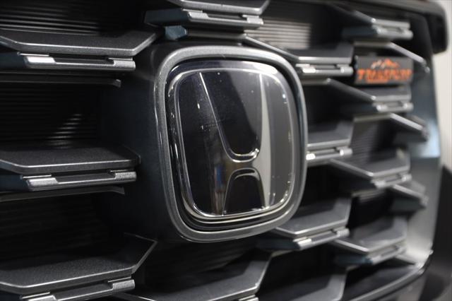 Photo of 2022 Crystal Black Pearl Honda Passport