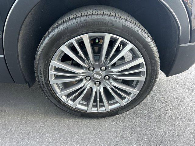 Photo of 2024 Stellar Black Metallic Cadillac XT4