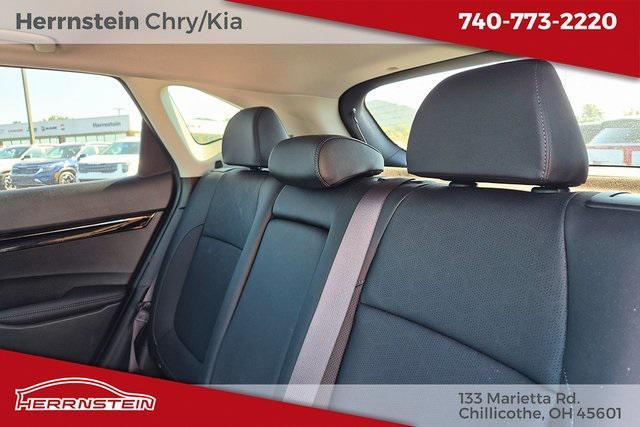 Photo of 2024 Pluton Blue/Black Roof Kia Seltos