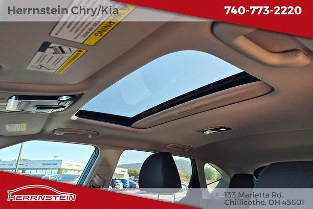 Photo of 2024 Pluton Blue/Black Roof Kia Seltos
