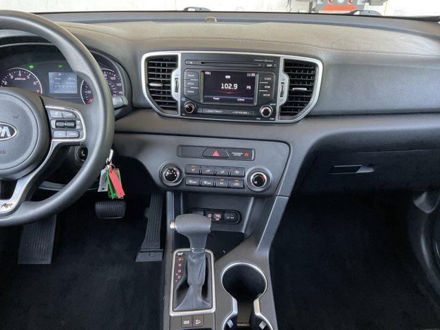 Photo of 2017 Black Cherry Kia Sportage