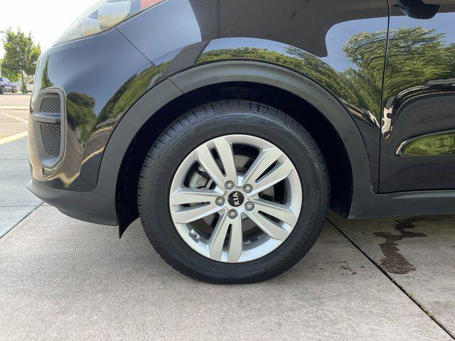 Photo of 2017 Black Cherry Kia Sportage