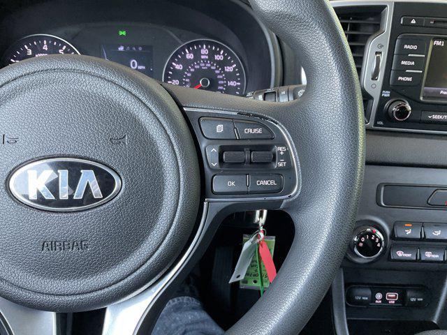 Photo of 2017 Black Cherry Kia Sportage