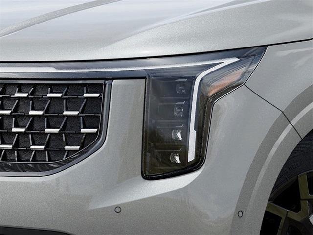 Photo of 2025 Ivory Silver Kia Carnival