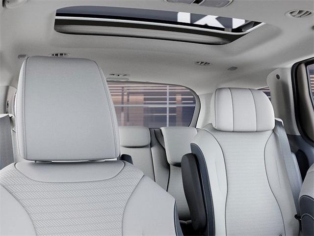 Photo of 2026 Ivory Silver Kia Carnival Hybrid