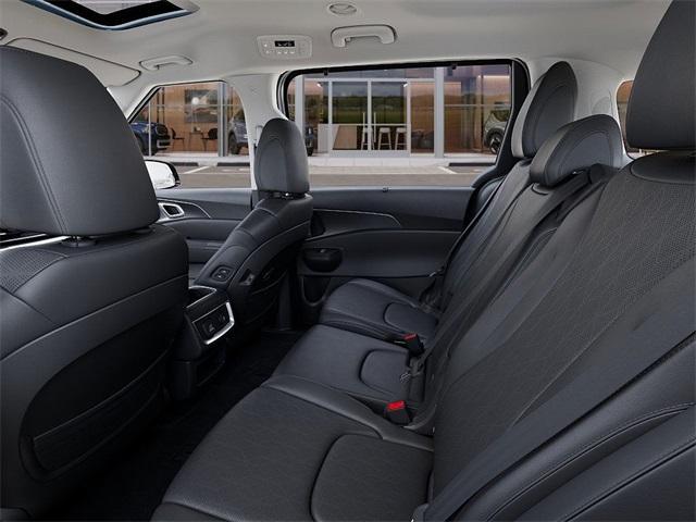 Photo of 2026 Astra Blue Kia Carnival Hybrid