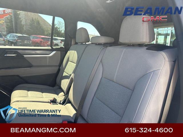 Photo of 2025 Volcanic Red Tintcoat GMC Acadia