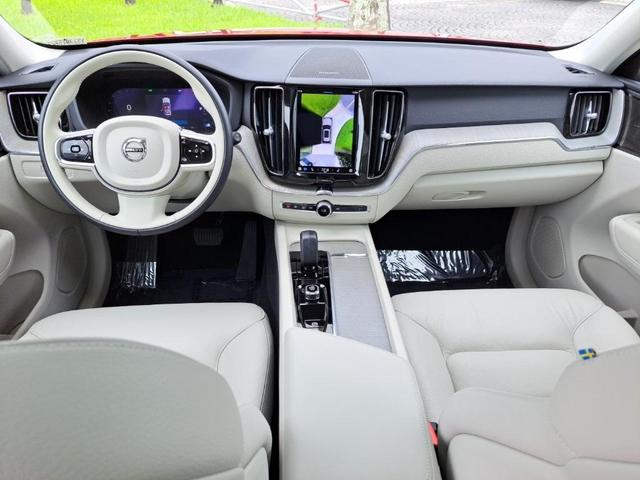 Photo of 2024 Fusion Red Metallic Volvo XC60