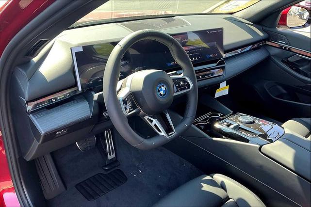 Photo of 2026 Vegas Red Metallic BMW i5