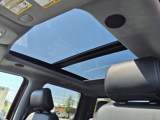 Photo of 2025 Ruby Red Metallic Tinted Clearcoat Ford F-350