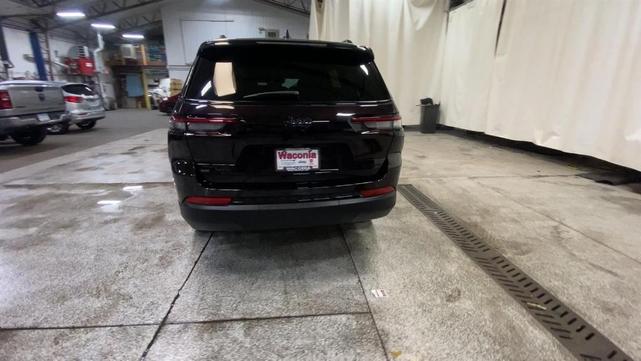 Photo of 2023 Ember Pearlcoat Jeep Grand Cherokee L
