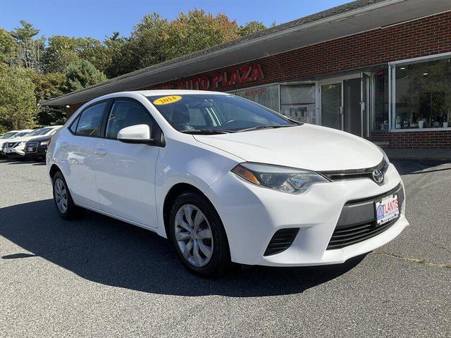 Photo of 2014 Super White Toyota Corolla