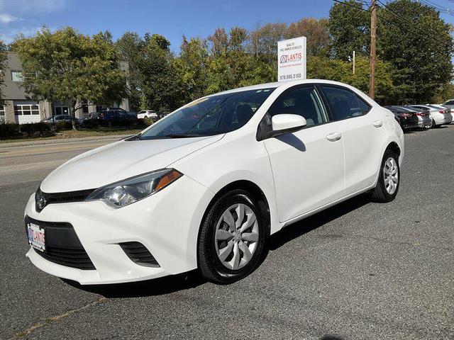 Photo of 2014 Super White Toyota Corolla